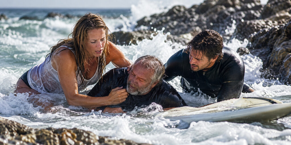 She Was Filming the Waves When a Surfer Disappeared. Then She Ran Into the Water.